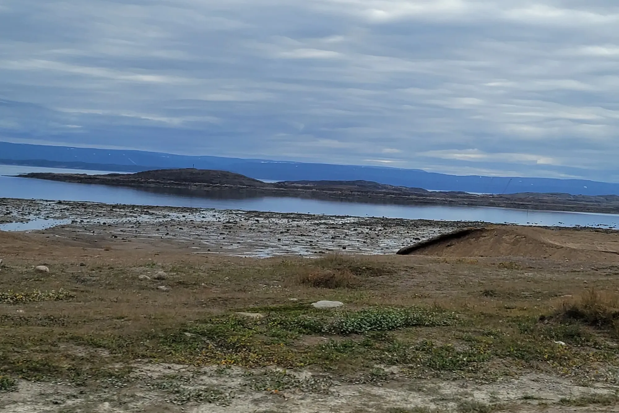 Nunavut landscape with water and islands in the distance.